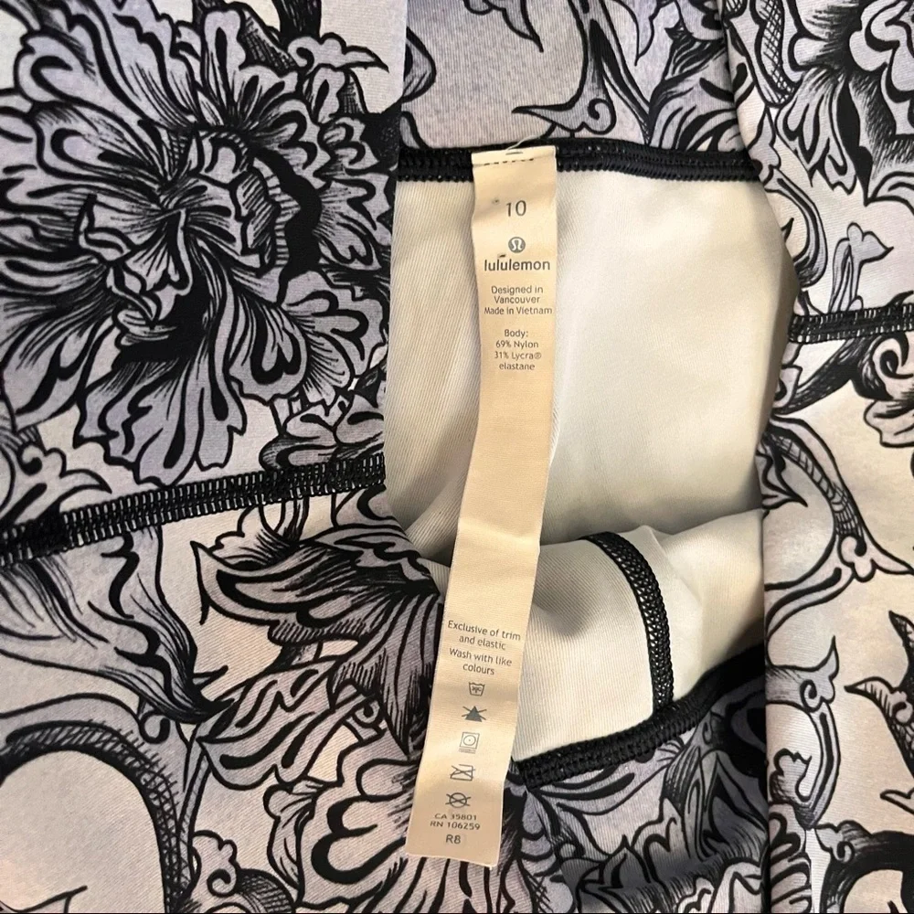 Lululemon Womens high rise crop leggings tights Sz 10 black gray floral